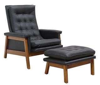 CONTEMPORARY BLACK UPHOLSTERED ARMCHAIR & OTTOMAN
