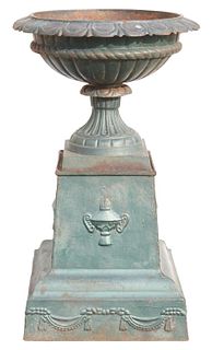 NEOCLASSICAL STYLE CAST IRON GARDEN URN ON PLINTH
