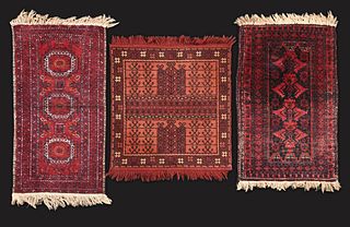 A lot of five small Persian and Turkish style rugs