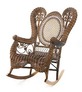A Victorian Wicker Rocking Chair, Height 41 1/2 inches.