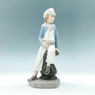Boy With Yacht 1004810 - Lladro Porcelain Figurine