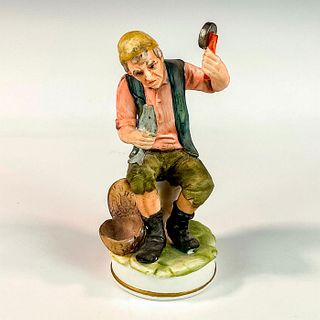 Hand-Painted Porcelain Figurine, Fisherman
