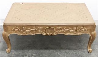 An Asian Export Fumed Wood Low Table, Height 16 1/2 x width 43 1/4 x depth 28 1/4 inches.