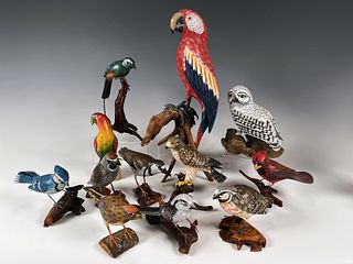 TWELVE CARVED AND PAINTED BIRDS