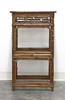A Rattan Side Table, Height 31 3/8 x width 18 x depth 12 3/4 inches.