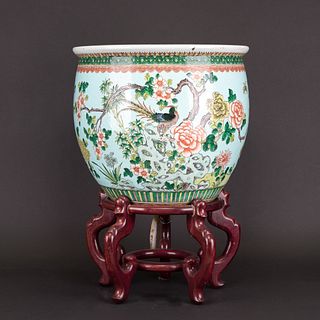 A SKY-BLUE GROUND FAMILLE ROSE JARDINIERE, 19TH CENTURY, WITH STAND 