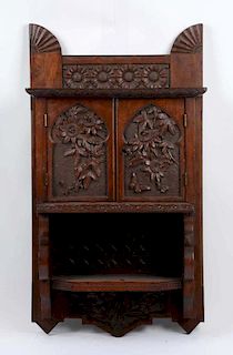 Carved Walnut Wall Cabinet.