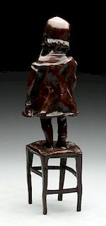 Figural Bronze Girl Standing on Chair.