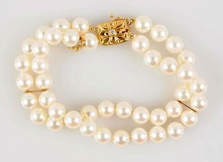 18K Yellow Gold Pearl & Diamond Bracelet.