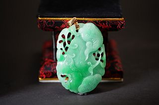 A CHINESE FISH AND LOTUS JADE CARVING WITH GOLD HOOK