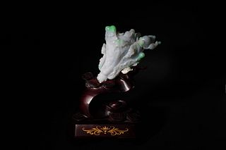 A JADEITE CARVING OF CABBAGE WITH BASE