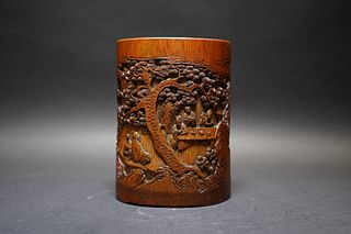 A CHINESE WOODEN BRUSH POT WITH FIGURE AND PINE TREE CARVING