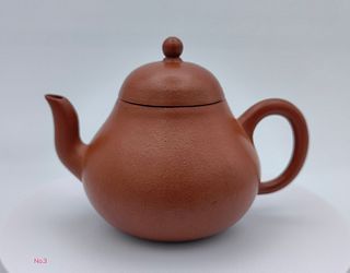 A SHORT MOUTH ZISHA TEAPOT WITH CERTIFICATE