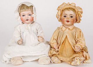 Two bisque head toddler dolls
