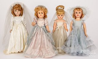 Four composition, hard plastic and vinyl dolls