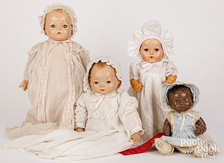 Four composition baby dolls