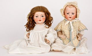 Two bisque dolls