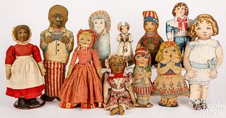 Large group of printed cloth dolls