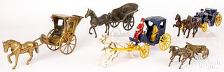 Five horse drawn carts and wagons