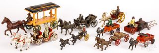 Large group of cast iron horse drawn toy parts