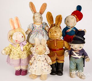Six dressed vintage plush rabbits