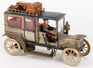 Carrette tin plate clockwork limousine with driver
