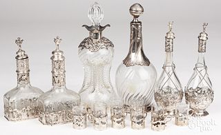 Silver mounted bottles and cordials, mostly 800