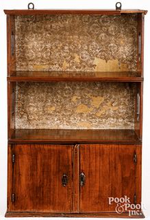 Fruitwood hanging cabinet, 19th c.