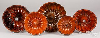 Five redware Turk's head molds, 19th c.