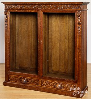 Carved oak bookcase, late 19th c.
