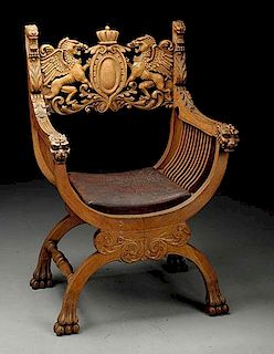 Ornately Carved Armchair.