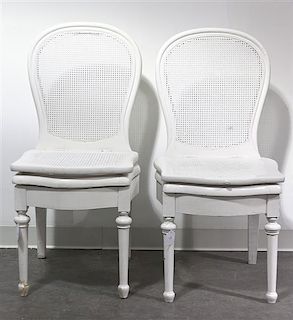 A Pair of White Painted Commode Chairs, Height 39 inches.