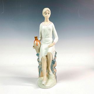 Casades Porcelain Seated Woman Figurine