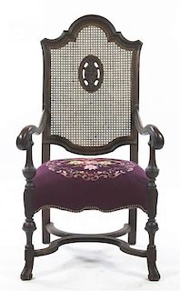 A Victorian Mahogany Open Armchair, Height 47 inches.