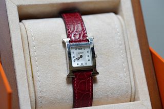 A HERMES HEURE H WATCH WITH DIAMOND,  RED STRAP