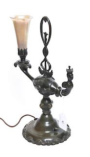 A Bronze and Iridescent Glass Table Lamp, Height 14 1/4 inches.