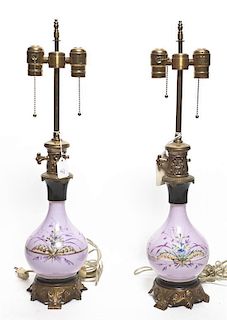 A Pair of Continental Porcelain Table Lamps, Height overall 24 1/4 inches.