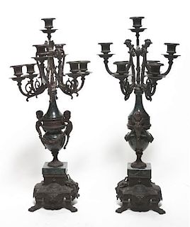 A Pair of Neoclassical Style Cast Metal and Marble Seven-Light Candelabra, Height overall 24 inches.