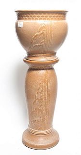 An American Pottery Jardiniere and Pedestal, likely Roseville, Height overall 27 inches.