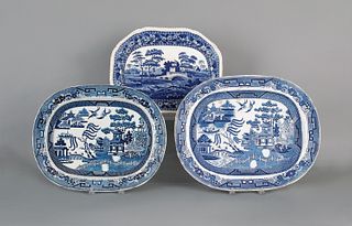 Two blue willow platters, 19th c., 16 1/2" l., 21"