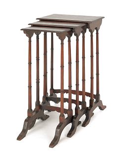 Three Regency style mahogany nesting tables, 27 1/