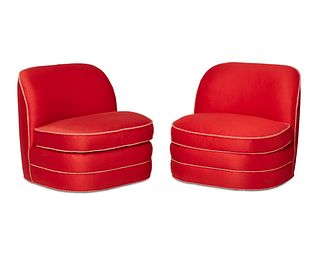 A pair of contemporary upholstered slipper chairs