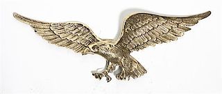 A Cast Brass Eagle Mount, Width 29 3/4 inches.