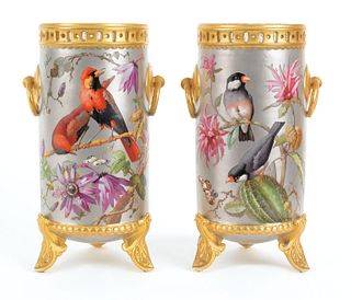Pair of painted porcelain vases with bird decorati