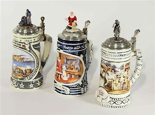 A Group of Three Commemorative Steins Height of tallest 10 inches.