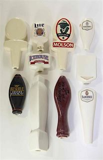 A Collection of Eighteen Haeger Pottery Beer Taps Height of tallest 10 3/4 inches.