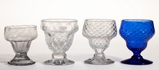 20TH CENTURY PATTERN-MOLDED GLASS OPEN SALTS, LOT OF FOUR