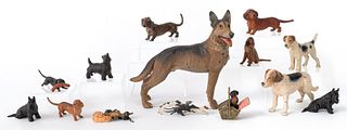Fourteen Austrian cold painted bronze dogs, mid 20