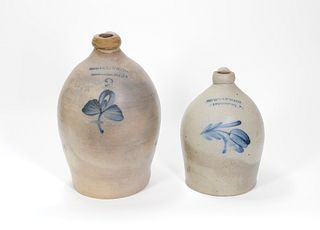 Two Pennsylvania stoneware jugs, 19th c., impresse