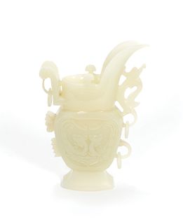 Chinese carved jade libation pitcher, 7 3/4" h.